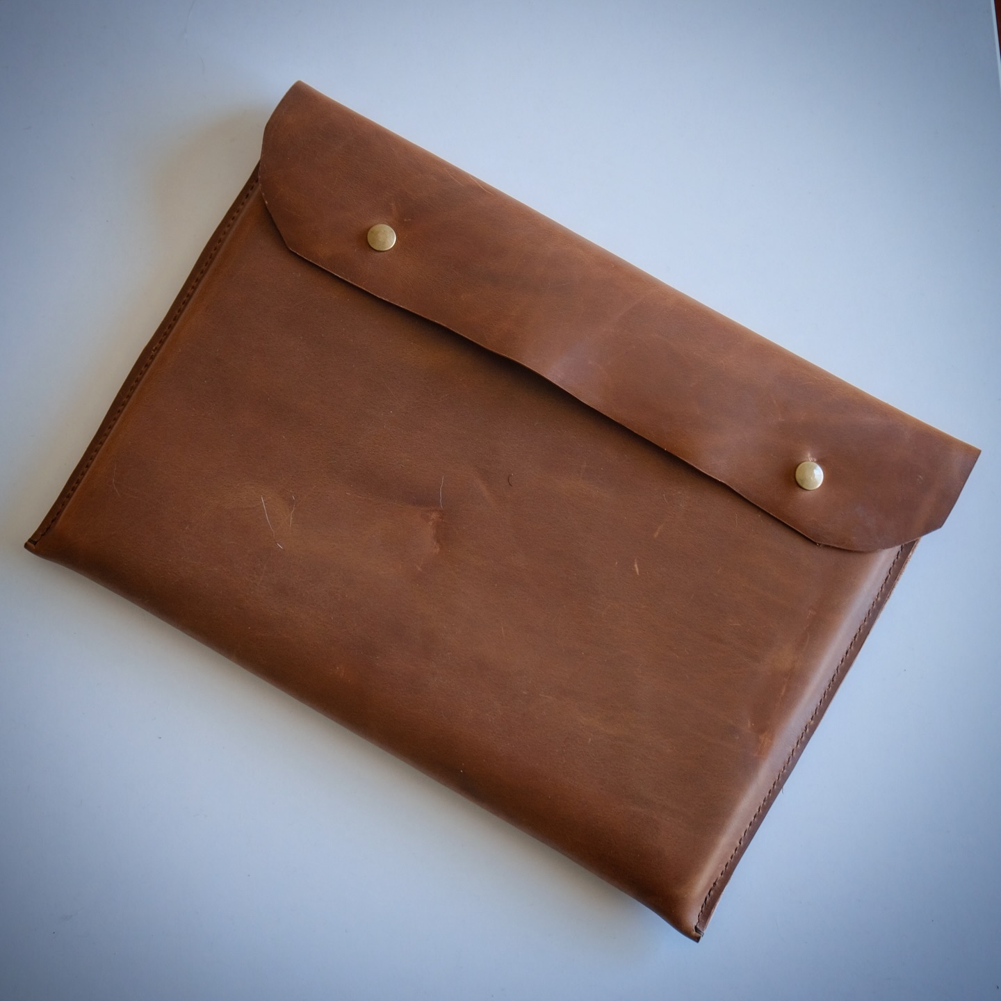Leather laptop sleeve